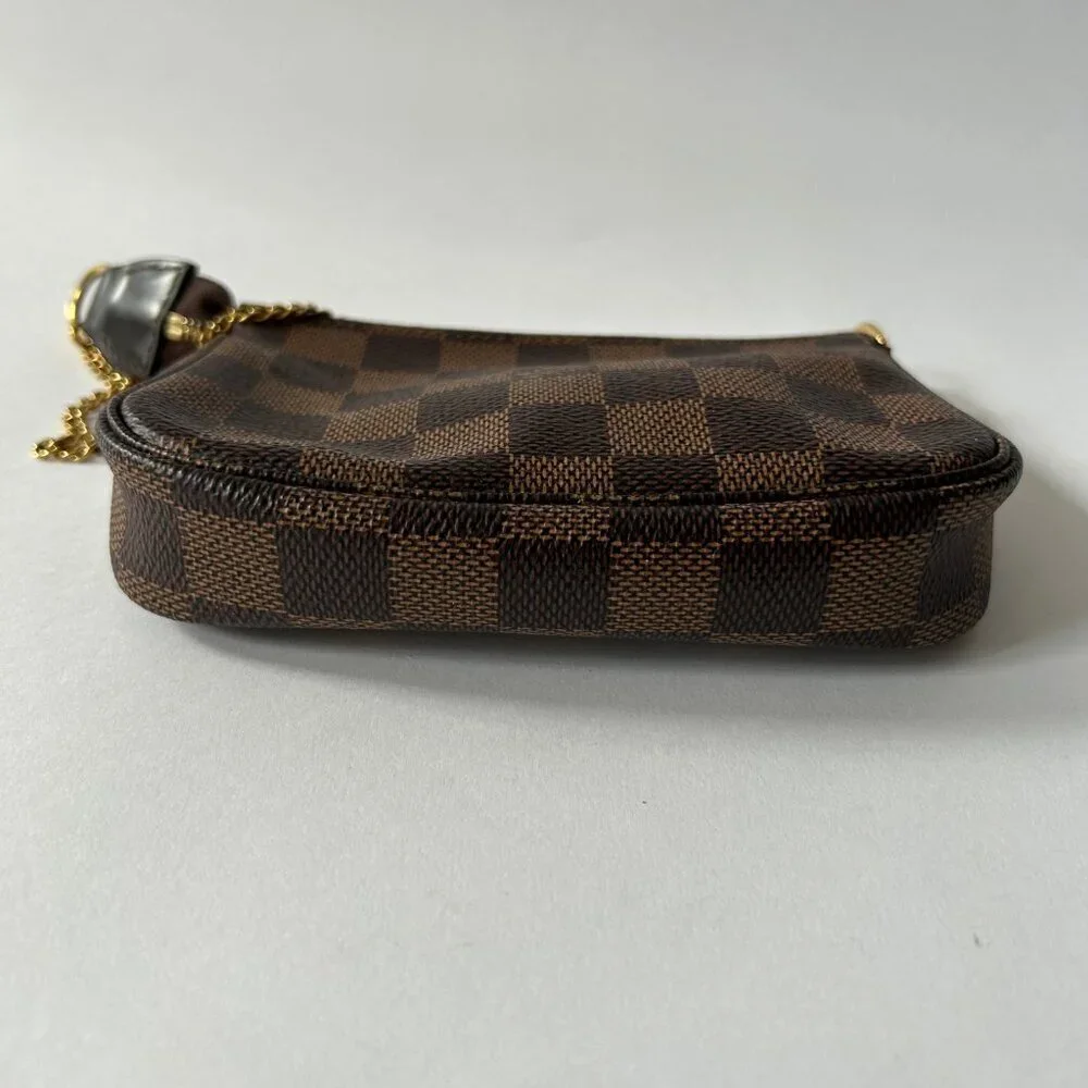 LOUIS VUITTON DAMIER EBENE MINI POCHETTE ACCESSOIRES
